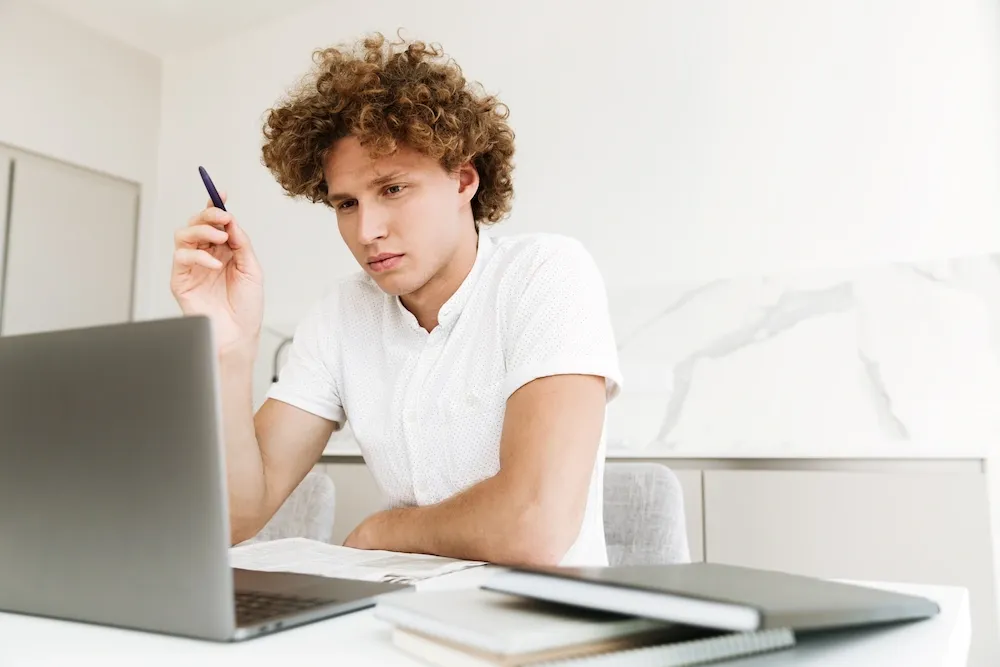Focused high school students studying the A-level Chemistry course online